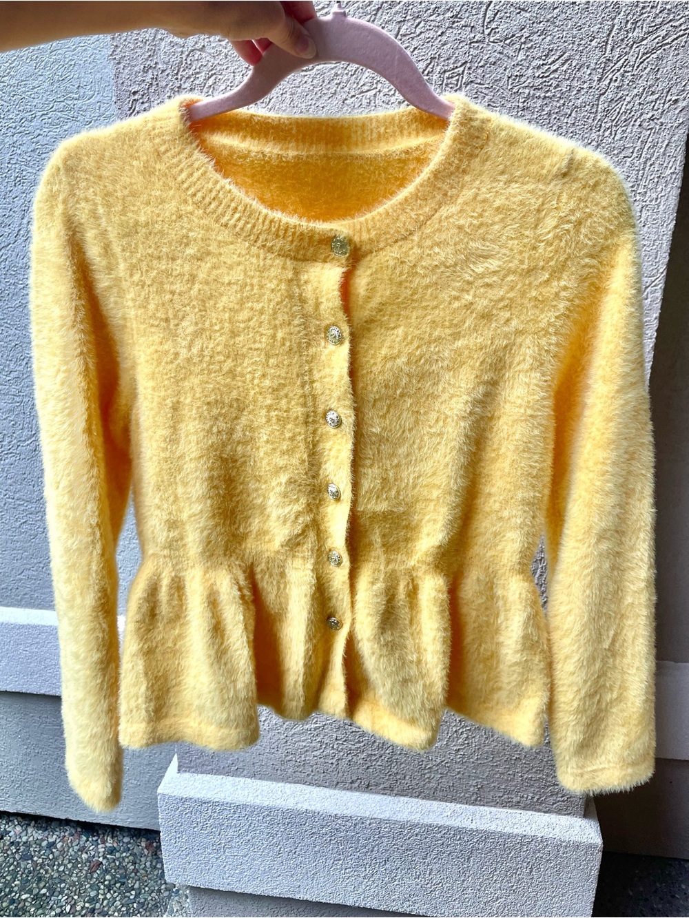 Yellow fuzzy peplum cardigan with gold buttons, unbranded